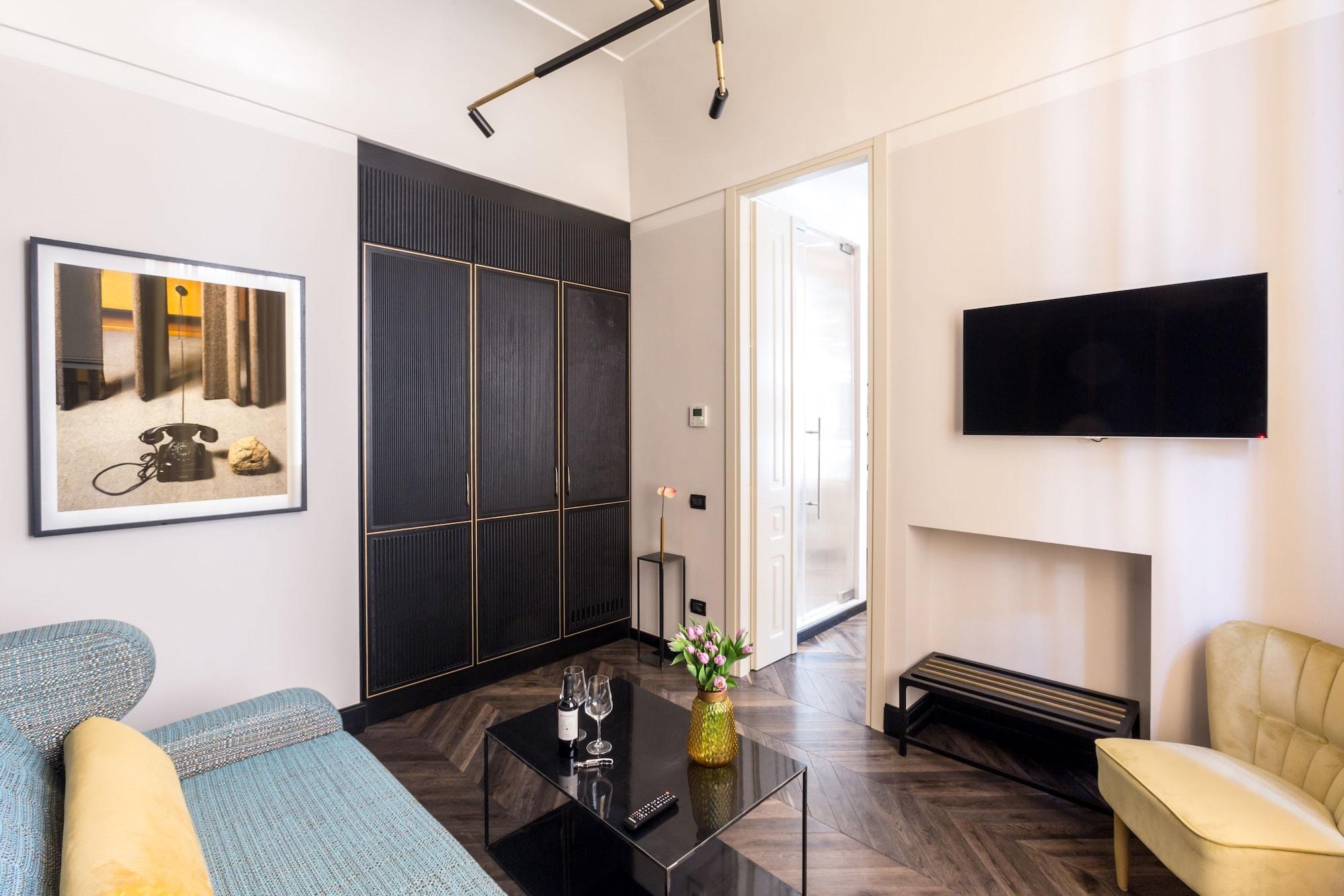 The H'All Tailor Suite Roma Exterior foto A room at the hotel