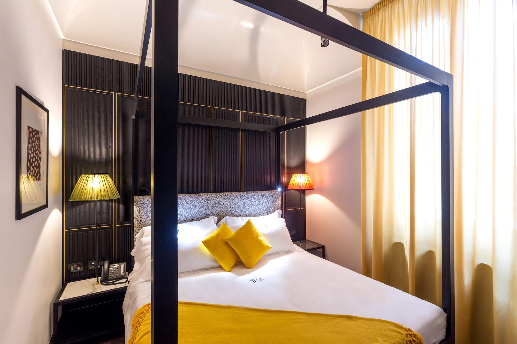 The H'All Tailor Suite Roma Exterior foto A bedroom at the hotel