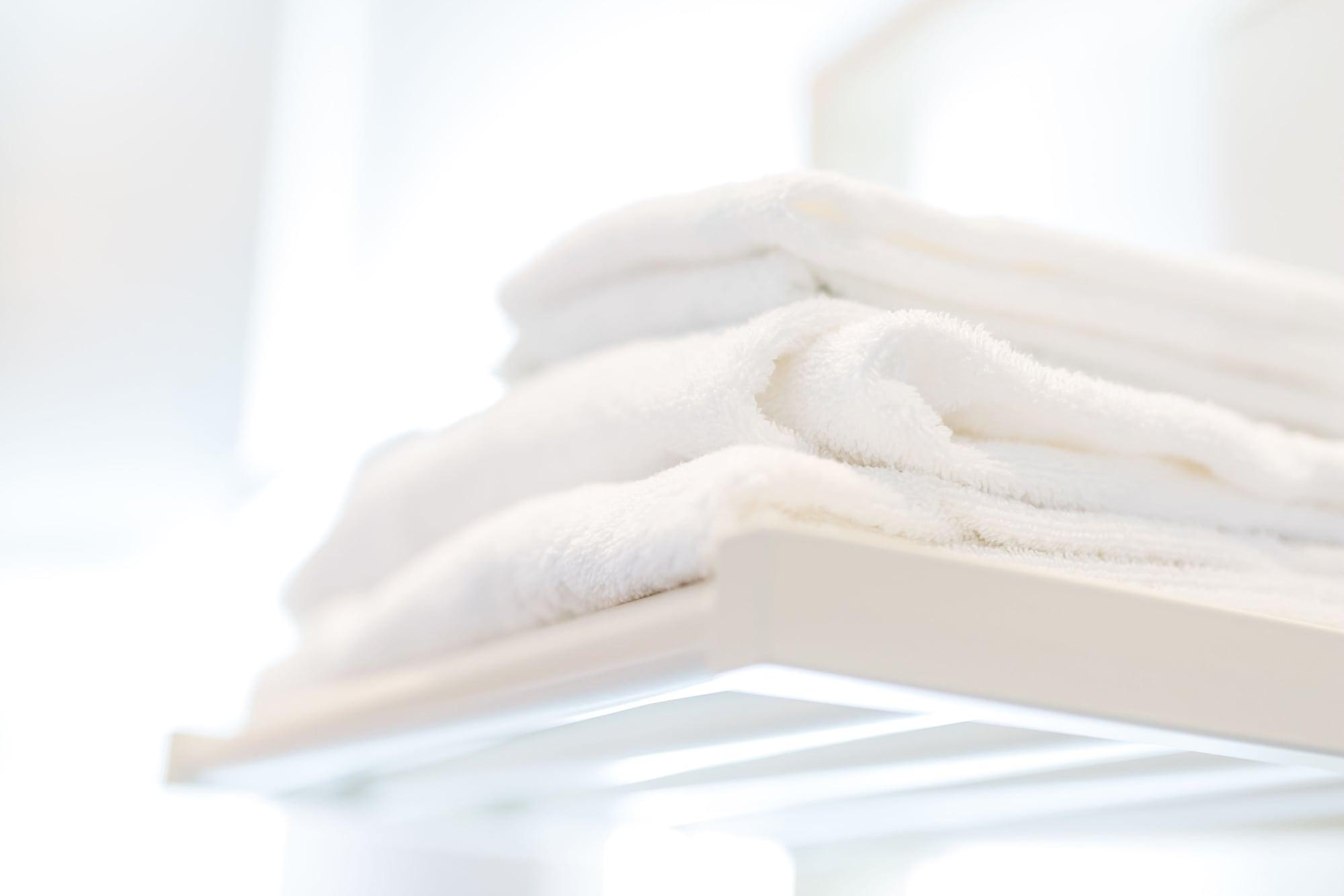 The H'All Tailor Suite Roma Exterior foto A clean white towel