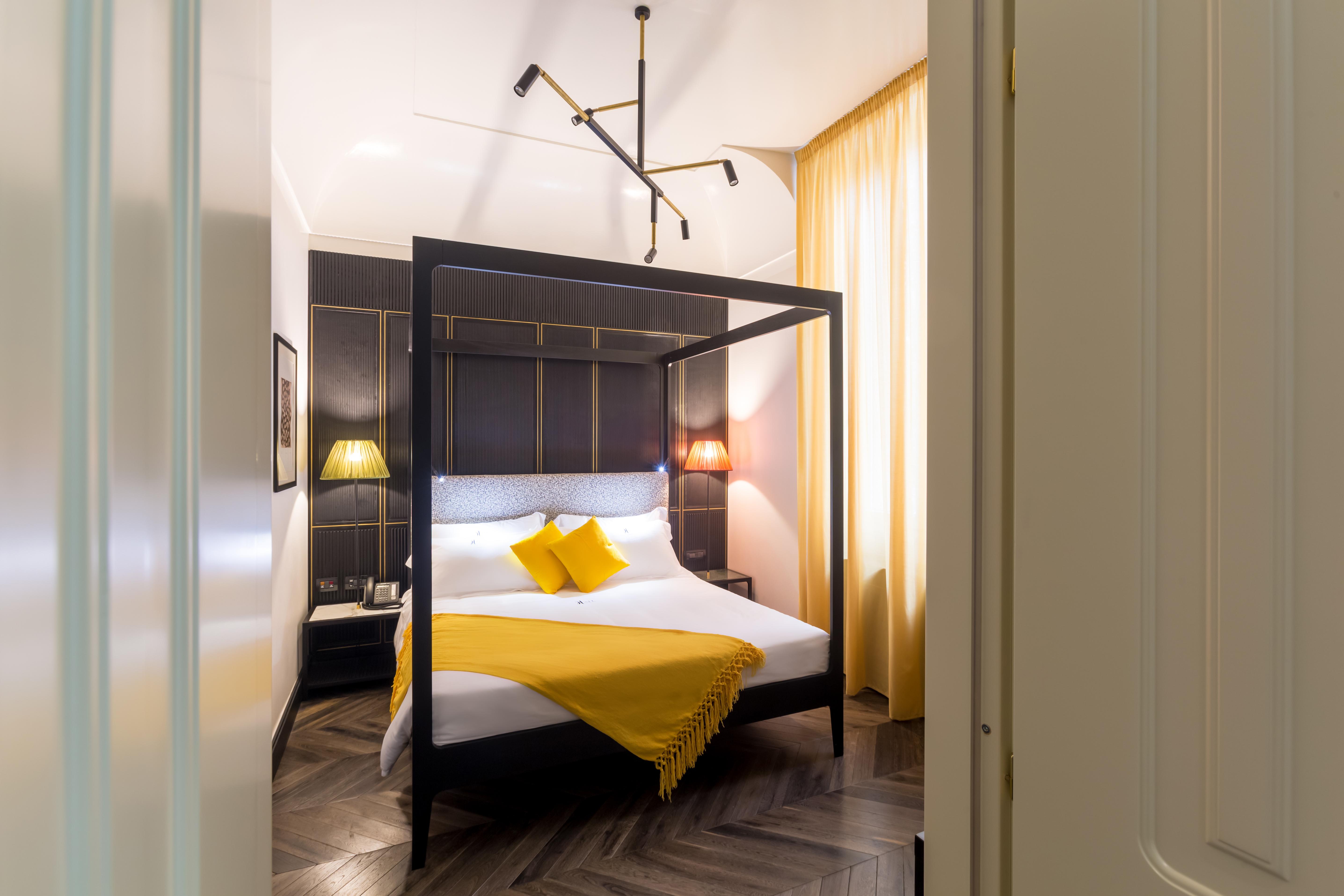 The H'All Tailor Suite Roma Exterior foto A bedroom at the hotel