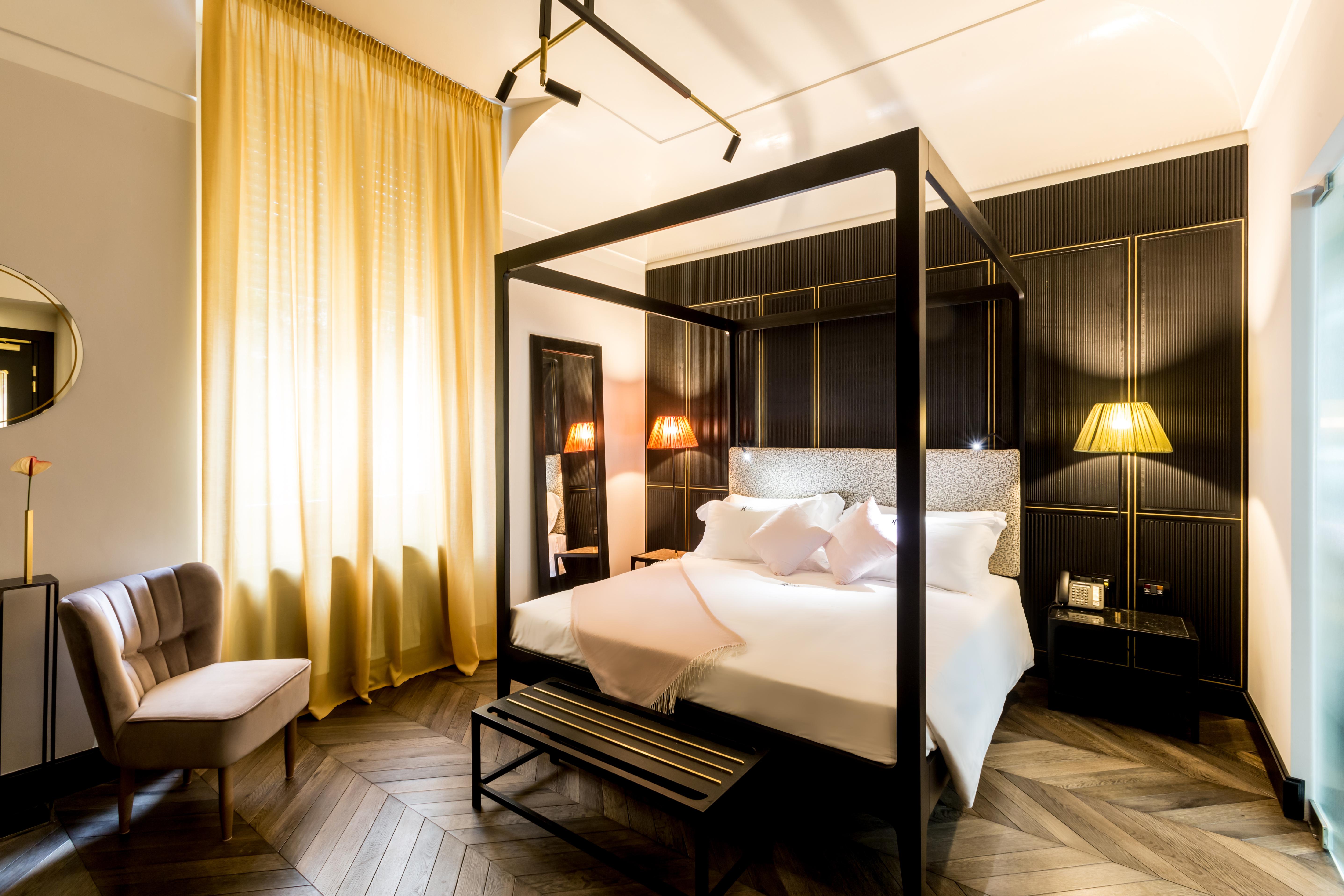The H'All Tailor Suite Roma Exterior foto A room at the Hotel