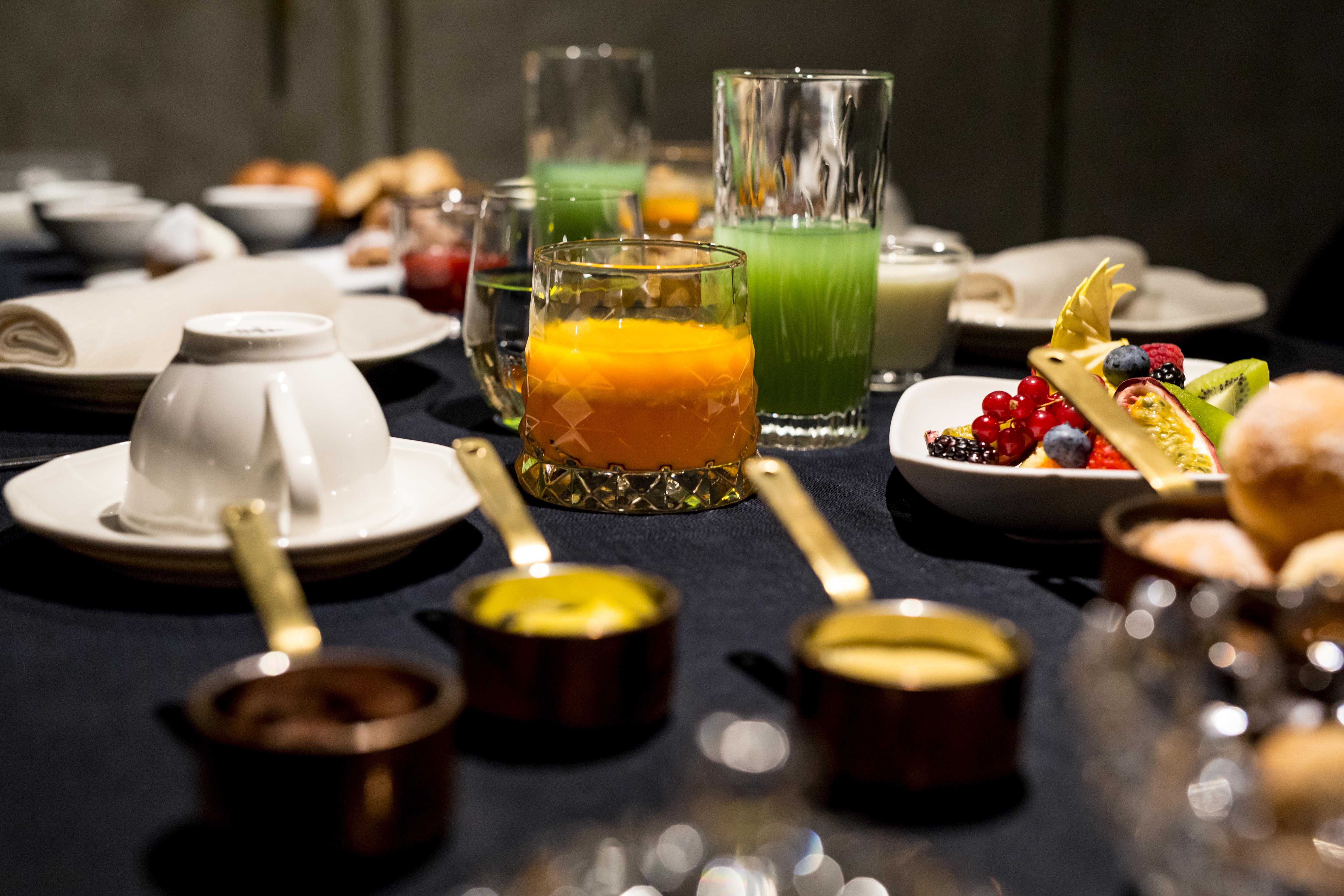 The H'All Tailor Suite Roma Exterior foto A selection of fruit juices