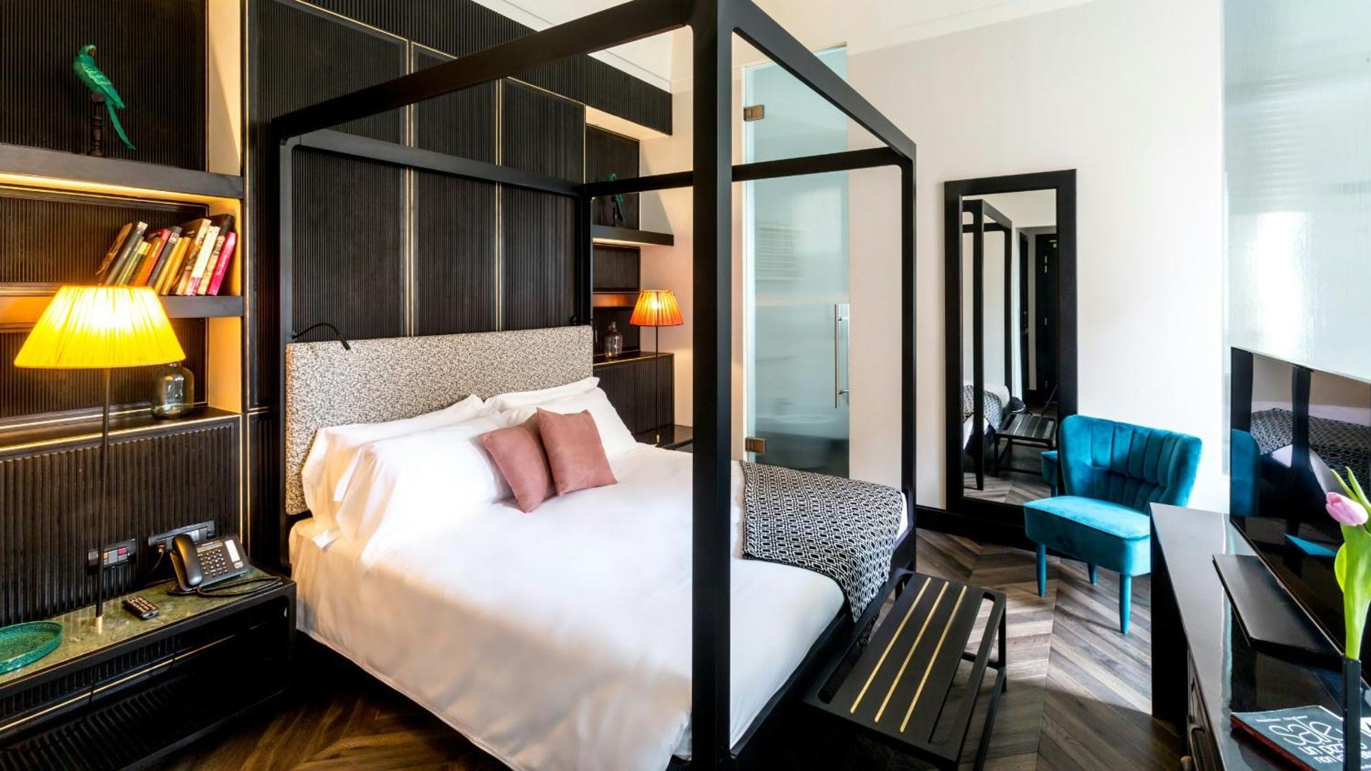 The H'All Tailor Suite Roma Exterior foto A bedroom at the hotel