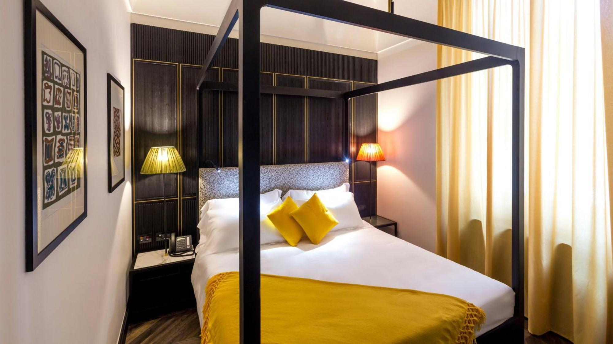 The H'All Tailor Suite Roma Exterior foto A room at the hotel