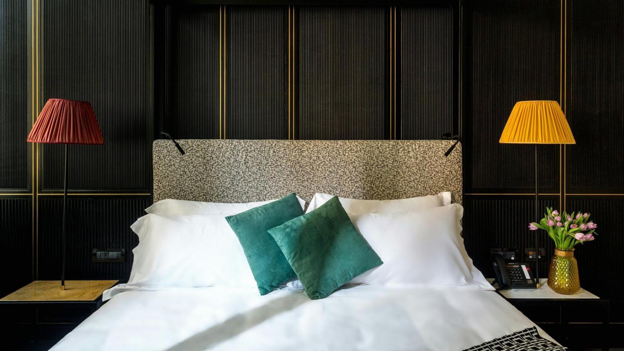 The H'All Tailor Suite Roma Exterior foto A bedroom at the hotel