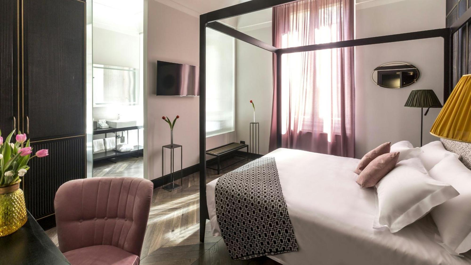 The H'All Tailor Suite Roma Exterior foto A room at the hotel