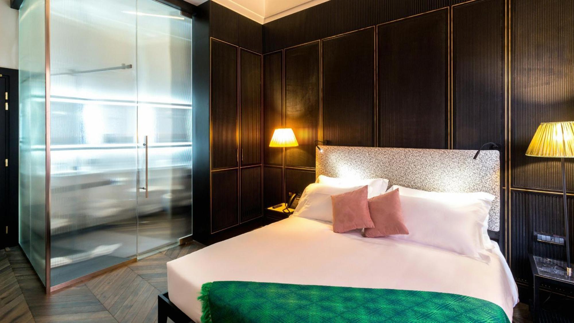 The H'All Tailor Suite Roma Exterior foto A bedroom at the hotel