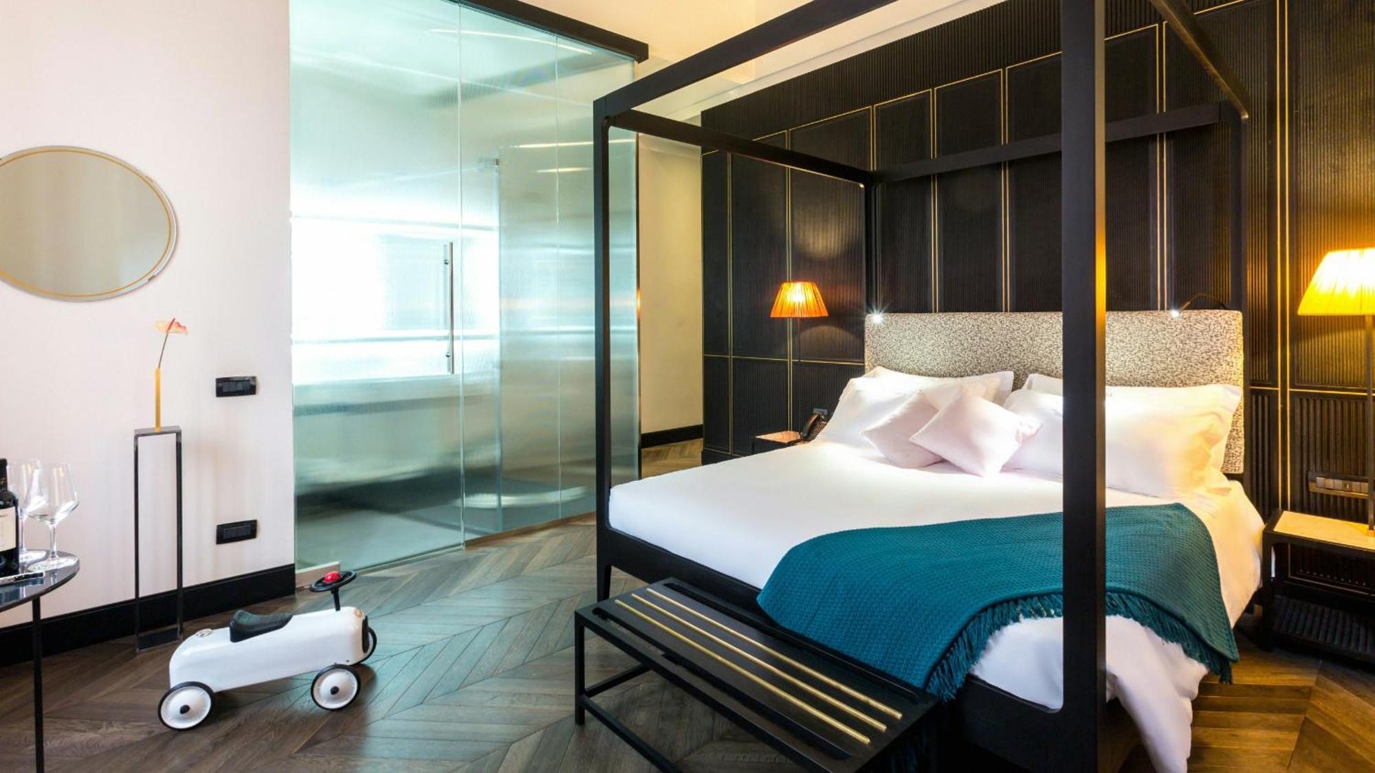 The H'All Tailor Suite Roma Exterior foto A room at the hotel